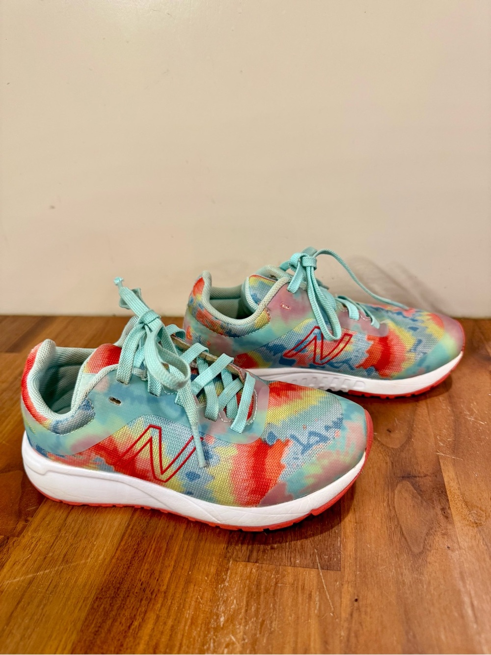New Balance Kids Tie-Dye Sneakers in Aqua, Coral, Yellow